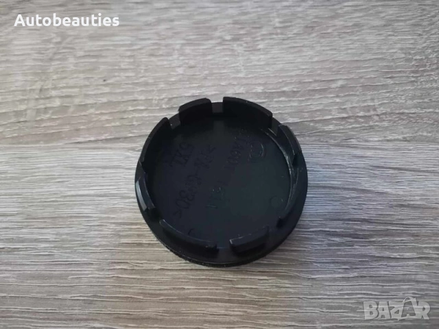 сребристи капачки за джанти за Dacia 56 мм, снимка 2 - Аксесоари и консумативи - 53232392